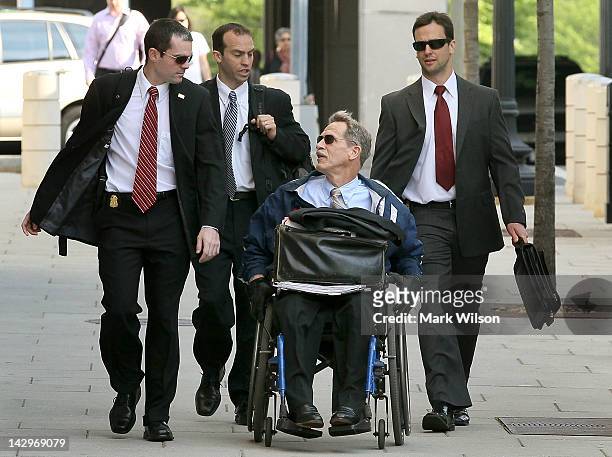 Prosecutor Daniel P. Butler , is flanked by members of his prosecution team as he arrives at Federal court house, on April 16, 2012 in Washington,...