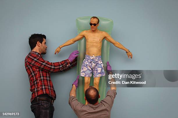 Drift' by artist Ron Mueck is hung by gallery technicians at the Hauser & Wirth gallery on April 16, 2012 in London, England. The series of four...