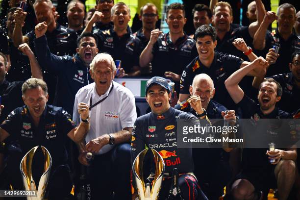 Race winner Sergio Perez of Mexico and Oracle Red Bull Racing celebrates with his team after the F1 Grand Prix of Singapore at Marina Bay Street...
