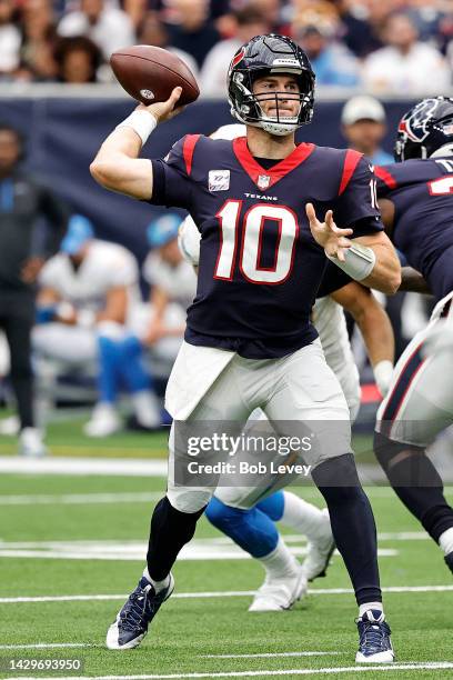 Davis Mills of the Houston Texans throws a pass in the first quarter against the Los Angeles Chargers at NRG Stadium on October 02, 2022 in Houston,...