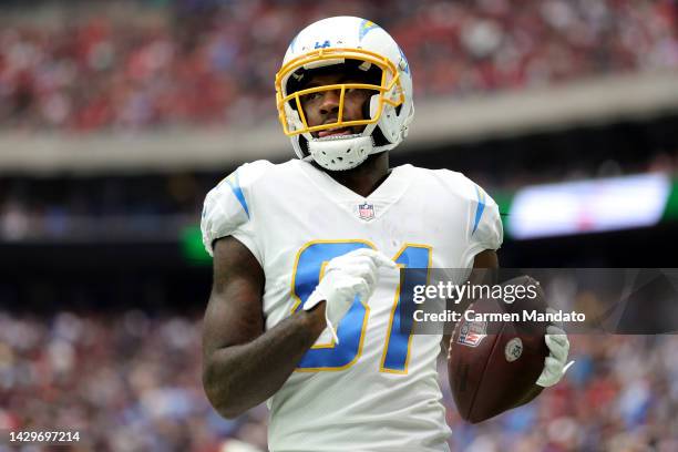 Mike Williams of the Los Angeles Chargers reacts after making a catch in the second quarter against the Houston Texans at NRG Stadium on October 02,...