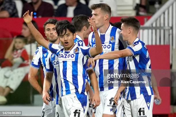 Takefusa Kubo of Real Sociedad celebrates after scoring the fifth goal for Real Sociedad during the LaLiga Santander match between Girona FC and Real...