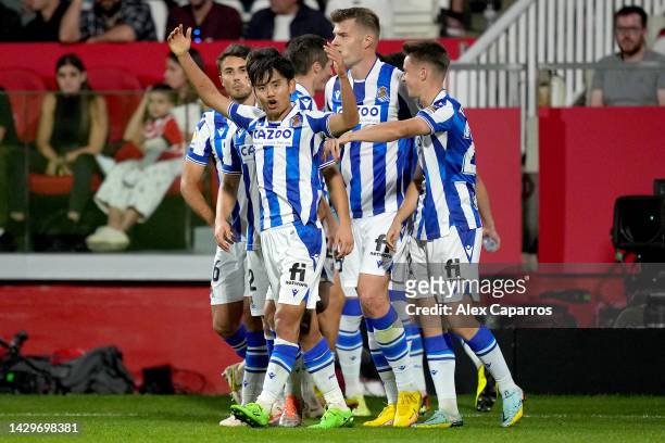 Takefusa Kubo of Real Sociedad celebrates after scoring the fifth goal for Real Sociedad during the LaLiga Santander match between Girona FC and Real...