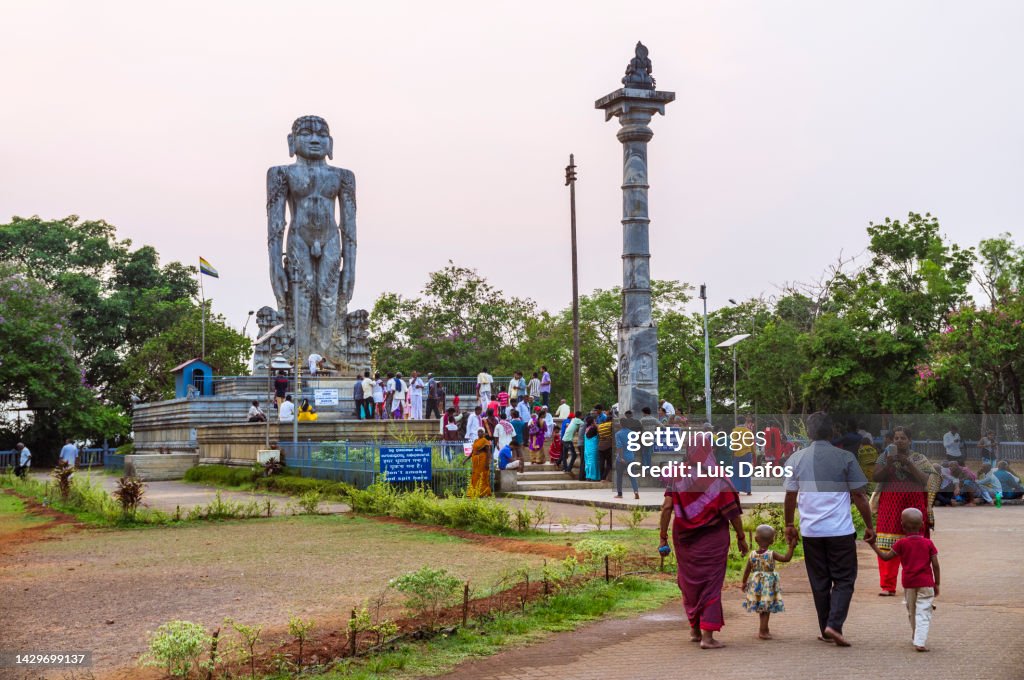 Pilgrims walk towards the Bahubali (Gomateshwara) statue at Ratnagiri Hill.