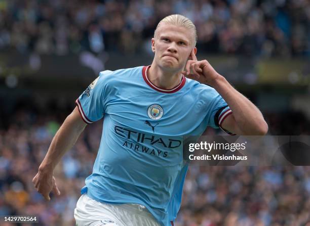 Erling Haaland of Manchester City celebrates scoring his second goal of a hat trick during the Premier League match between Manchester City and...