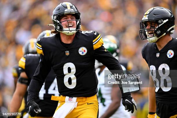 Kenny Pickett of the Pittsburgh Steelers celebrates after scoring a touchdown in the third quarter against the New York Jets at Acrisure Stadium on...