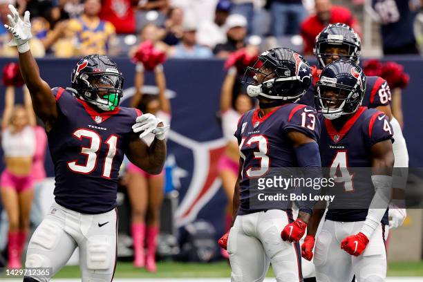 Brandin Cooks of the Houston Texans celebrates with teammates after scoring a touchdown in the fourth quarter against the Los Angeles Chargers at NRG...