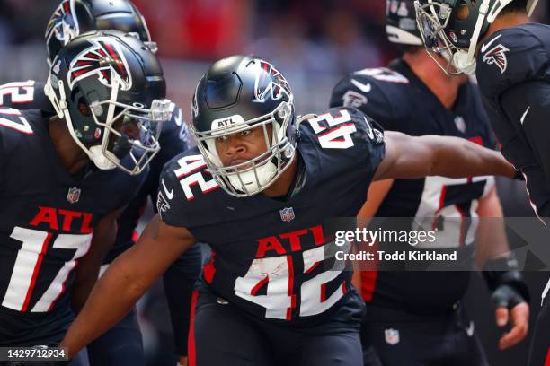 Caleb Huntley of the Atlanta Falcons reacts after a touchdown in the fourth quarter of the game against the Cleveland Browns at Mercedes-Benz Stadium...