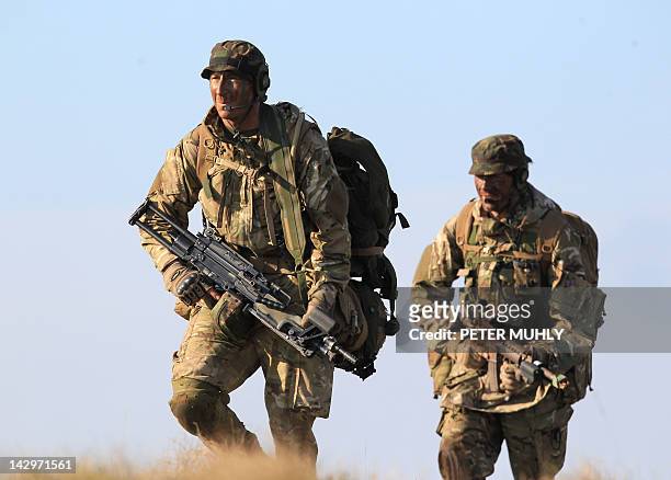 British soldiers secure a landing zone for the 16 Air Assault Brigade during the 16 Air Assault Brigade Exercise Joint Warrior at West Freugh...