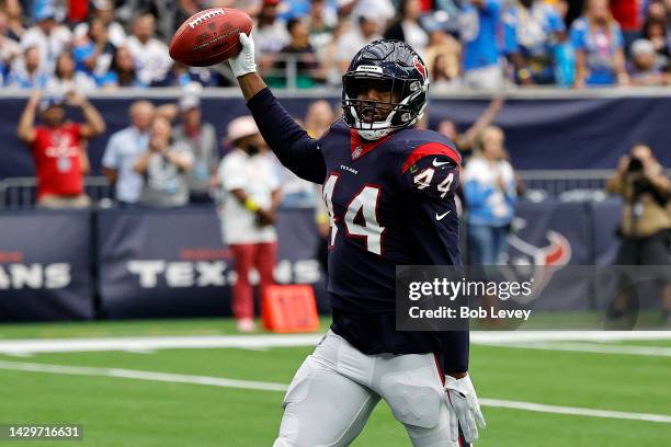Jalen Reeves-Maybin of the Houston Texans celebrates after recovering a fumble in the fourth quarter against the Los Angeles Chargers at NRG Stadium...