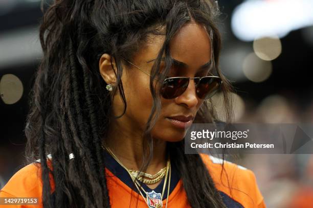 Singer Ciara Wilson, wife of Russell Wilson of the Denver Broncos, walks across the field before the game between the Denver Broncos and Las Vegas...