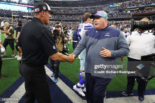 Head coach Ron Rivera of the Washington Commanders and head coach Mike McCarthy of the Dallas Cowboys shakes hands after Dallas' 25-10 win at AT&T...