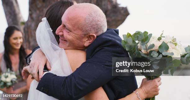 wedding, love and family with a father hugging a daughter on her marriage day during a celebration event at an outdoor venue. happy bride and her dad together at the alter for tradition and ceremony - wedding hair stock pictures, royalty-free photos & images