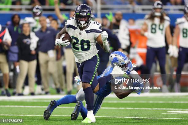Rashaad Penny of the Seattle Seahawks runs with the ball for a touchdown against the Detroit Lions during the third quarter at Ford Field on October...