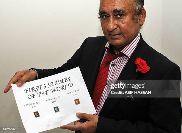 This photograph taken on April 14, 2012 shows Mohammad Ali Shah, the Pakistan's sports minister of Sindh province, displaying his collection...