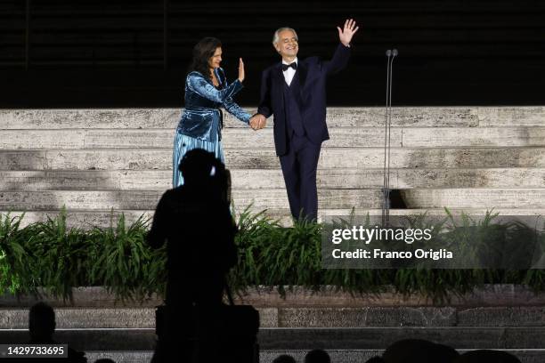 Italian operatic tenor Andrea Bocelli, flanked by is wife Enrica Cenzatti, performs during “Seguimi” a video projection depicting the life of St....