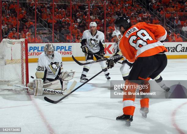 Jaromir Jagr of the Philadelphia Flyers is stopped by Marc-Andre Fleury of the Pittsburgh Penguins in Game Three of the Eastern Conference...