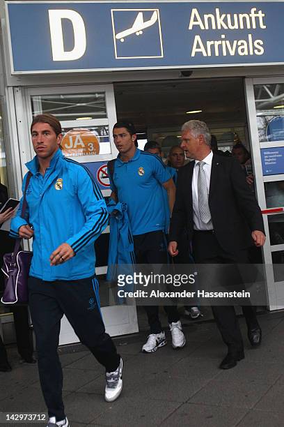 Cristiano Ronaldo and Sergio Ramos of Real Madrid arrives with her team at Munich airport´Franz-Josef Strauss´ on April 16, 2012 in Munich, Germany....