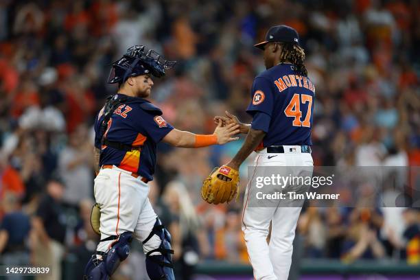 Christian Vazquez of the Houston Astros congratulates Rafael Montero after defeating the Tampa Bay Rays at Minute Maid Park on October 02, 2022 in...