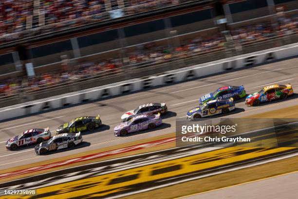 Denny Hamlin, driver of the FedEx Express Toyota, Aric Almirola, driver of the Smithfield Ford, William Byron, driver of the RaptorTough.com...