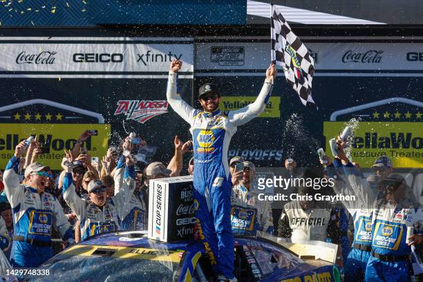 Chase Elliott, driver of the NAPA Auto Parts Chevrolet, celebrates in victory lane after winning the NASCAR Cup Series YellaWood 500 at Talladega...