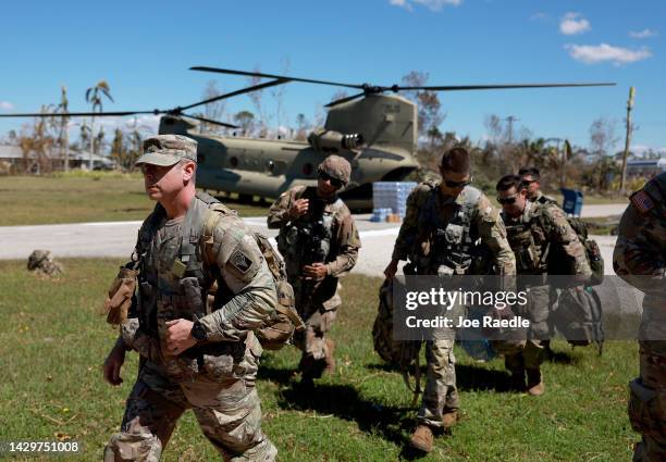 Members of Florida Army National Guard arrive on October 02, 2022 in Pine Island, Florida. Residents are being encouraged to leave because the only...