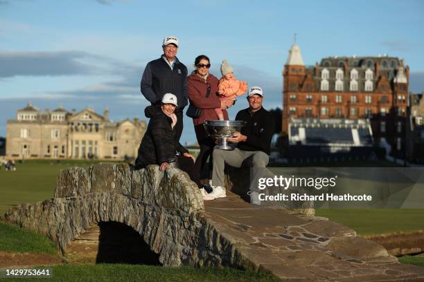 Ryan Fox of New Zealand poses with the trophy with mother Adele Fox, father and former New Zealand Rugby International Grant Fox, wife Anneke Fox and...