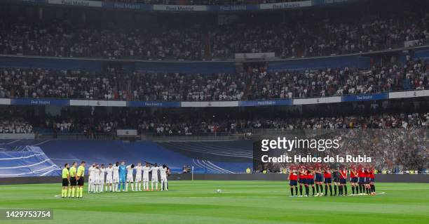 The teams observe a minute of silence in the memory of the fatal victims of a stampede during a football match in Indonesia, prior to the LaLiga...