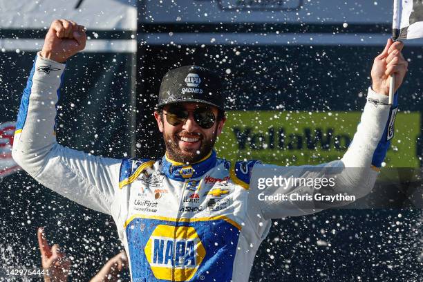 Chase Elliott, driver of the NAPA Auto Parts Chevrolet, celebrates in victory lane after winning the NASCAR Cup Series YellaWood 500 at Talladega...