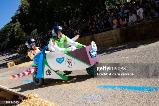 Participants drive their soapboxes down a street during the Red Bull Autos Locos soapbox race on October 02, 2022 in Madrid, Spain. Red Bull Soapbox...