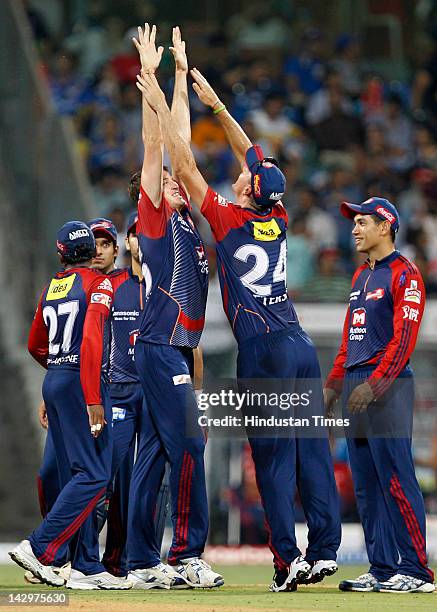 Delhi Daredevils bowler Morne Morkel celebrating with teammates after the dismissal of Mumbai Indians batsman Rudra Pratap Singh during the IPL T20...