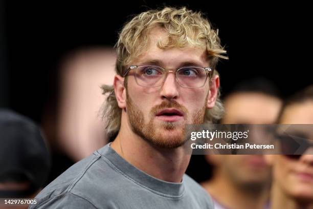 Logan Paul looks on during the game between the Denver Broncos and the Las Vegas Raiders at Allegiant Stadium on October 02, 2022 in Las Vegas,...