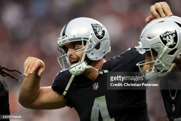 Derek Carr of the Las Vegas Raiders celebrates after Josh Jacobs scored a touchdown in the fourth quarter against the Denver Broncos at Allegiant...