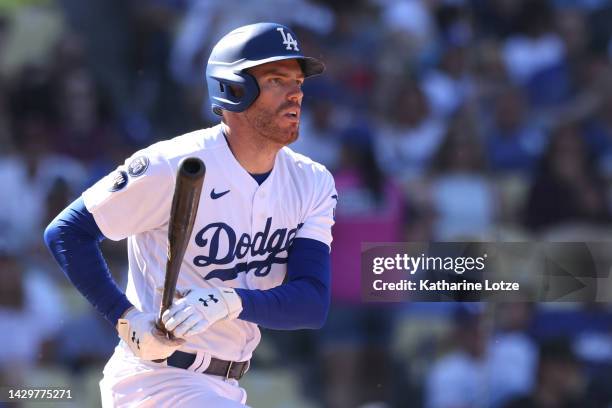 Freddie Freeman of the Los Angeles Dodgers runs for first after a hit in the sixth inning against the Colorado Rockies at Dodger Stadium on October...