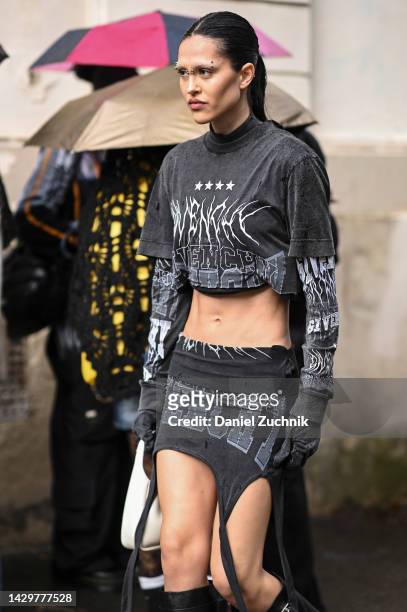 Amelia Gray Hamlin is seen wearing a gray Givenchy top and skirt outside the Givenchy show during Paris Fashion Week S/S 2023 on October 02, 2022 in...