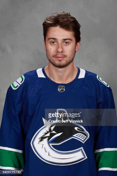 Quinn Hughes of the Vancouver Canucks poses for his official headshot for the 2022-2023 season on September 21, 2022 at Rogers Arena in Vancouver,...
