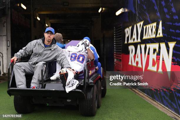 Jamison Crowder of the Buffalo Bills is carted off the field after being injured in the third quarter against the Baltimore Ravens at M&T Bank...