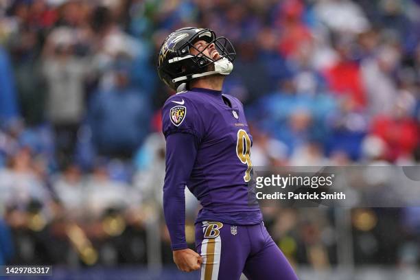 Kicker Justin Tucker of the Baltimore Ravens celebrates after kicking a field goal in the second quarter against the Buffalo Bills at M&T Bank...