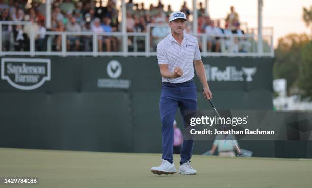 Mackenzie Hughes of Canada reacts after putting in to win on the second playoff hole against Sepp Straka of Austria on the 18th green during the...