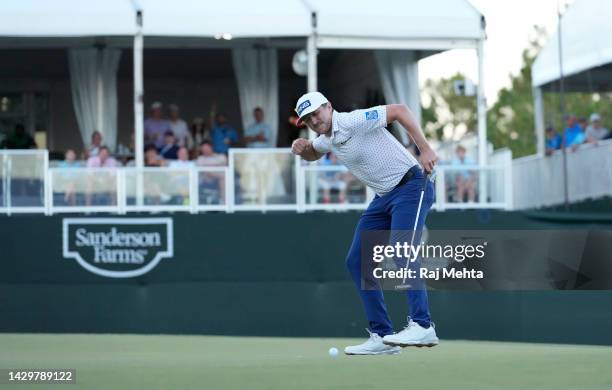 Mackenzie Hughes of Canada reacts after putting in to win on the second playoff hole against Sepp Straka of Austria on the 18th green during the...