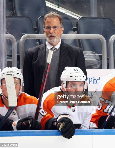 Head coach John Tortorella of the Philadelphia Flyers handles the bench against the New York Islanders at the UBS Arena on October 02, 2022 in...