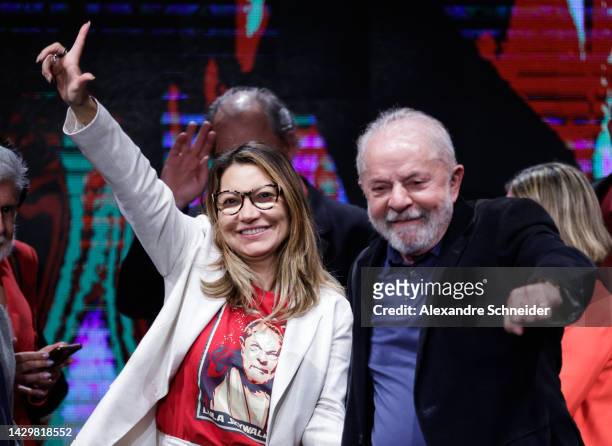Former president of Brazil and candidate of Worker's Party Luiz Inacio Lula da Silva and his wife Rosangela da Silva wave to supporters during a...