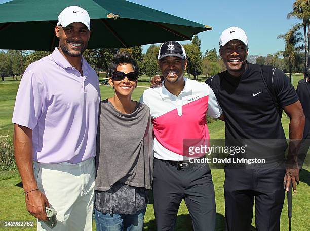 Actors Boris Kodjoe, Halle Berry, Dondre Whitfield and Flex Alexander attend the 4th annual Halle Berry Celebrity Golf Classic at Wilshire Country...