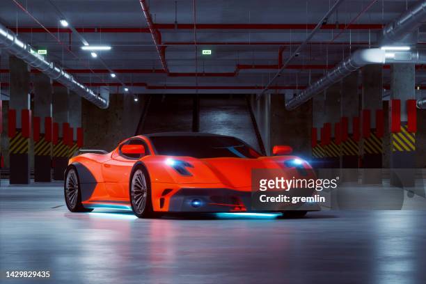 luxury sports car in underground garage - sportwagen stockfoto's en -beelden