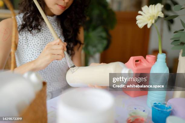 flower vase from waste plastic bottles. - arranging art stock pictures, royalty-free photos & images