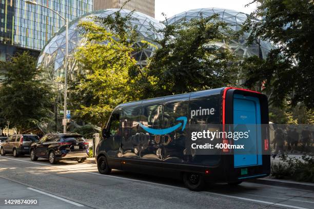 prime ev delivery - amazon headquarters stock pictures, royalty-free photos & images