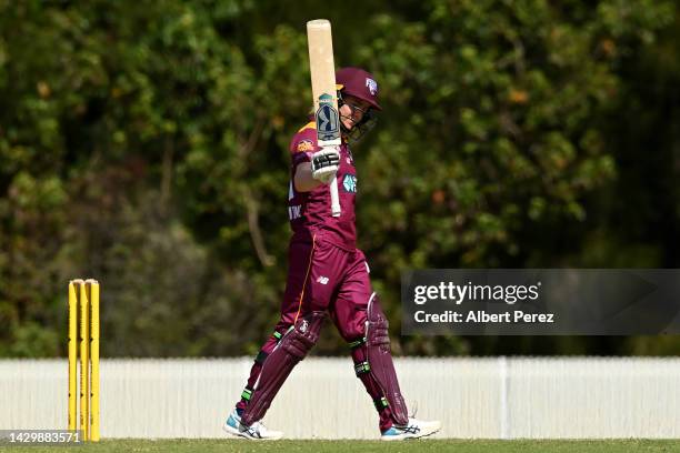 Georgia Redmayne of Queensland celebrates her half century during the WNCL match between Queensland and the Australian Capital Territory at Bill...