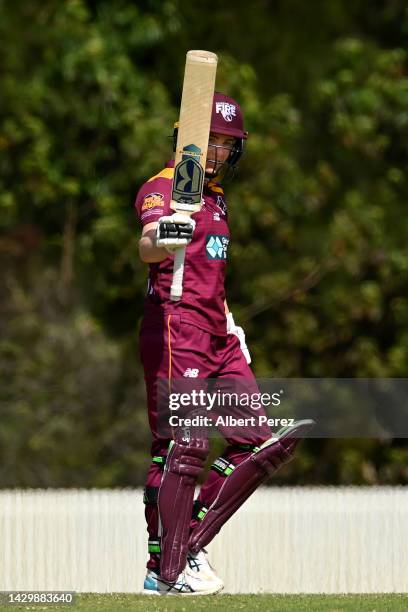 Georgia Redmayne of Queensland celebrates her half century during the WNCL match between Queensland and the Australian Capital Territory at Bill...