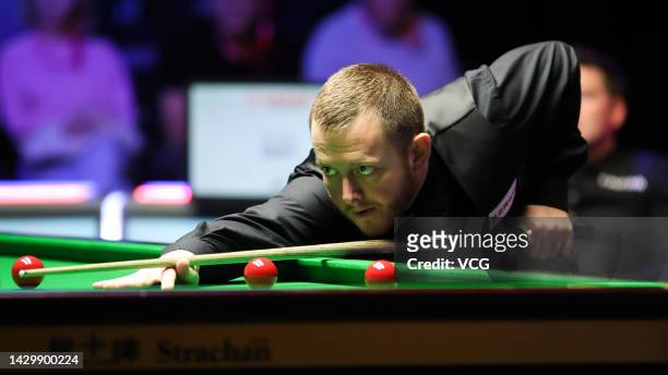 Mark Allen of Northern Ireland plays a shot in the final match against Ryan Day of Wales on day seven of the 2022 Cazoo British Open at Marshall...