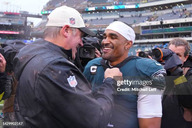 Head coach Doug Pederson of the Jacksonville Jaguars talks to Jalen Hurts of the Philadelphia Eagles after the game at Lincoln Financial Field on...
